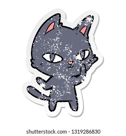 distressed sticker of a cartoon cat staring