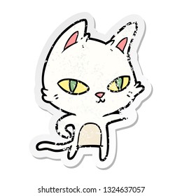 distressed sticker of a cartoon cat staring