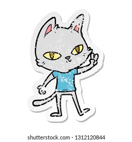 distressed sticker of a cartoon cat waving