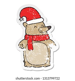 distressed sticker of a cartoon christmas bear