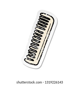 distressed sticker of a cartoon comb