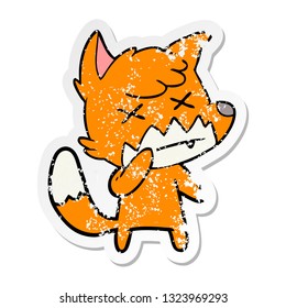 distressed sticker of a cartoon cross eyed fox