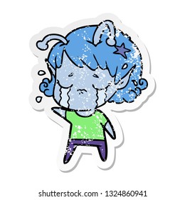 distressed sticker of a cartoon crying alien girl