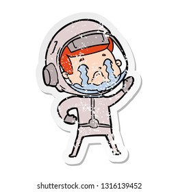 distressed sticker of a cartoon crying astronaut