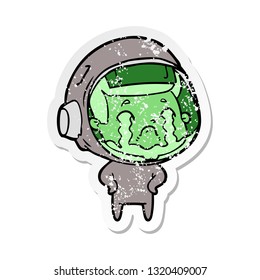 distressed sticker of a cartoon crying astronaut