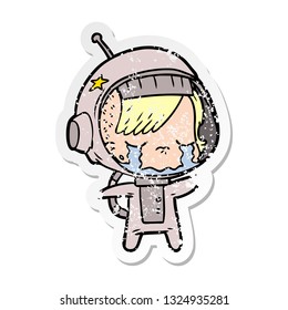 distressed sticker of a cartoon crying astronaut girl