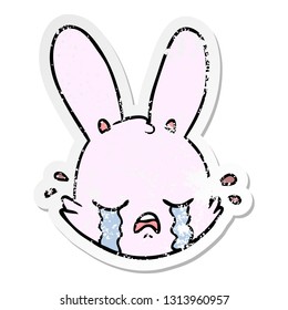 distressed sticker of a cartoon crying bunny face