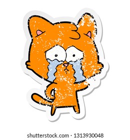 distressed sticker of a cartoon crying cat