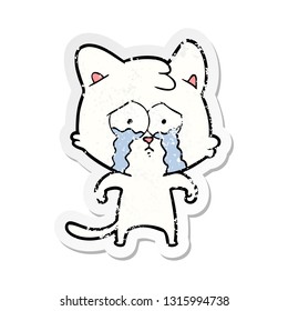 distressed sticker of a cartoon crying cat