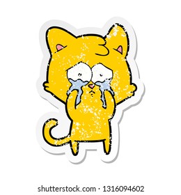 distressed sticker of a cartoon crying cat