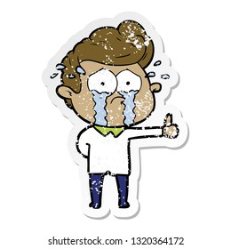 distressed sticker of a cartoon crying man