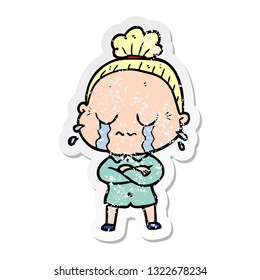 distressed sticker of a cartoon crying old lady