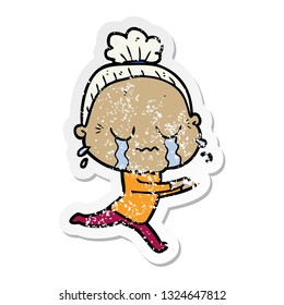 distressed sticker of a cartoon crying old lady