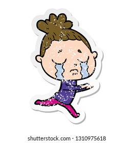distressed sticker of a cartoon crying woman