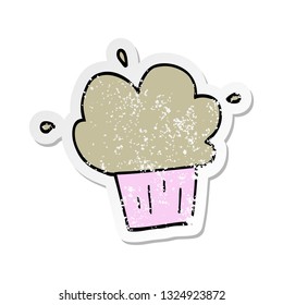 distressed sticker of a cartoon cupcake