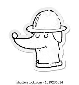 distressed sticker of a cartoon dog wearing hat