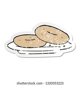 distressed sticker of a cartoon donuts