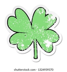distressed sticker of a cartoon four leaf clover