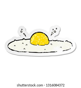 distressed sticker of a cartoon fried egg