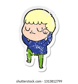 distressed sticker of a cartoon grumpy boy