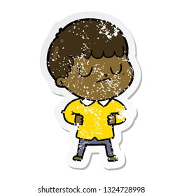 distressed sticker of a cartoon grumpy boy