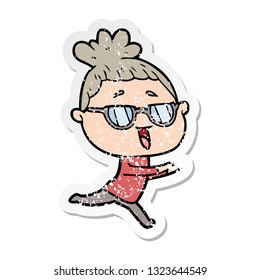 distressed sticker of a cartoon happy woman wearing spectacles
