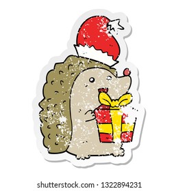 distressed sticker of a cartoon hedgehog wearing christmas hat