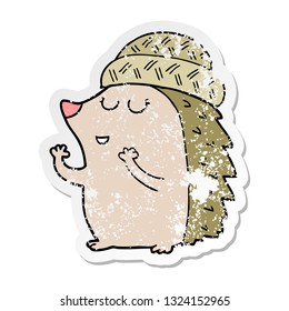 distressed sticker of a cartoon hedgehog wearing hat