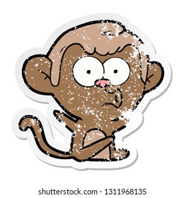 distressed sticker of a cartoon hooting monkey