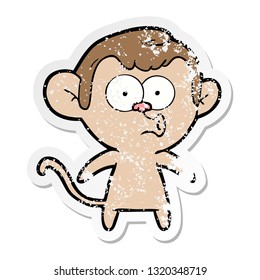 distressed sticker of a cartoon hooting monkey