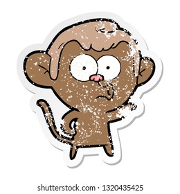distressed sticker of a cartoon hooting monkey