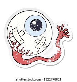 distressed sticker of a cartoon injured eyeball