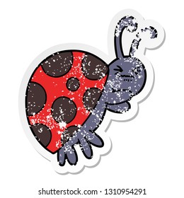 distressed sticker of a cartoon ladybug