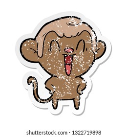 distressed sticker of a cartoon laughing monkey