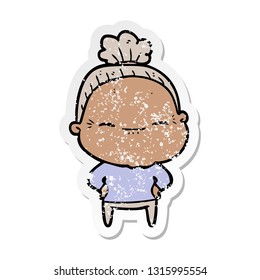 distressed sticker of a cartoon peaceful old woman