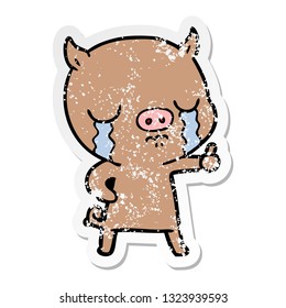 distressed sticker of a cartoon pig crying