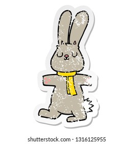 distressed sticker of a cartoon rabbit