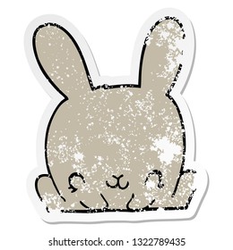 distressed sticker of a cartoon rabbit