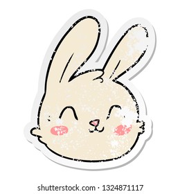 distressed sticker of a cartoon rabbit face