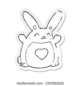 distressed sticker of a cartoon rabbit with love heart