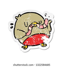 distressed sticker of a cartoon robin with worm