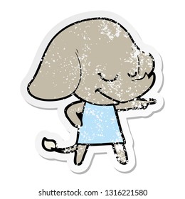 distressed sticker of a cartoon smiling elephant