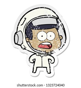 distressed sticker of a cartoon surprised astronaut