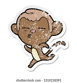 distressed sticker of a cartoon suspicious monkey