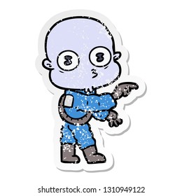 distressed sticker of a cartoon weird bald spaceman pointing