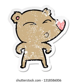 distressed sticker of a cartoon whistling bear
