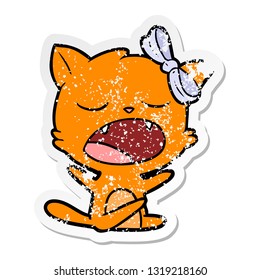 distressed sticker of a cartoon yawning cat