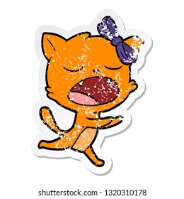 distressed sticker of a cartoon yawning cat