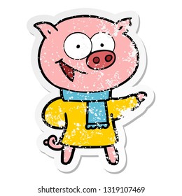 distressed sticker of a cheerful pig wearing winter clothes cartoon
