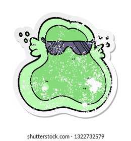 distressed sticker of a cool cartoon amoeba